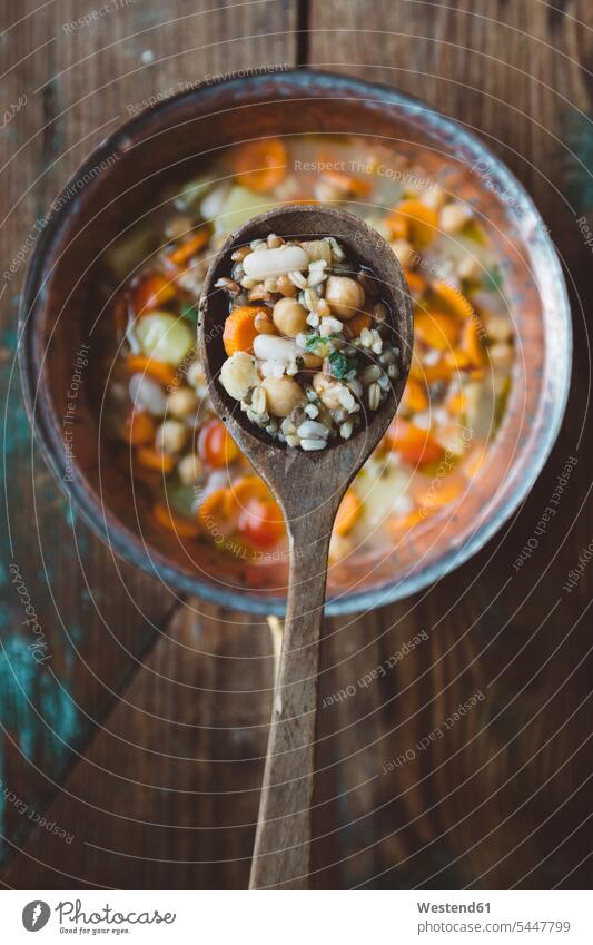 Spoon and Mediterranean soup food and drink Nutrition Alimentation Food and Drinks Onion Onions Carrot Carrots Cherry Tomato Cherry Tomatoes wooden close-up