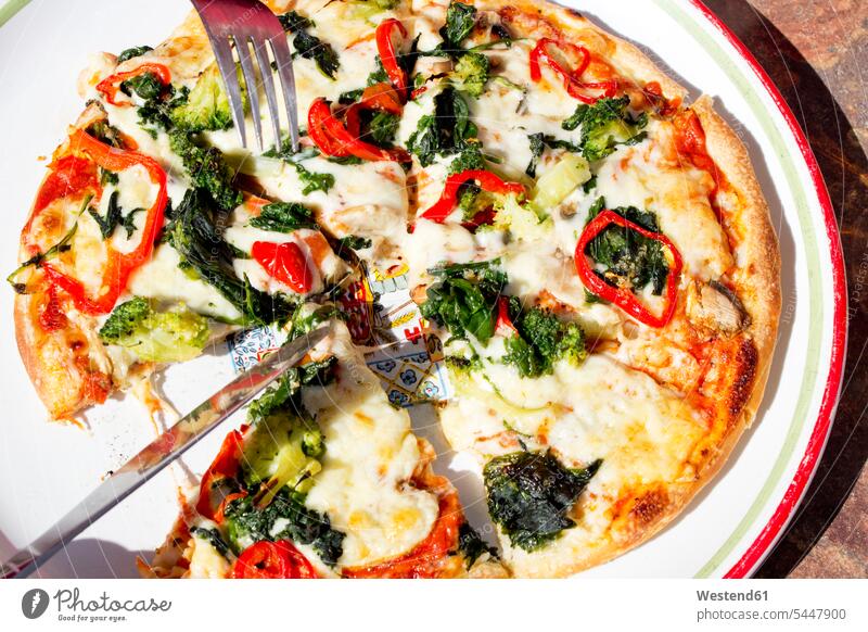 Vegetarian pizza on plate food and drink Nutrition Alimentation Food and Drinks ready to eat ready-to-eat garnished Tomato Tomatoes Italian Food Italian Cuisine
