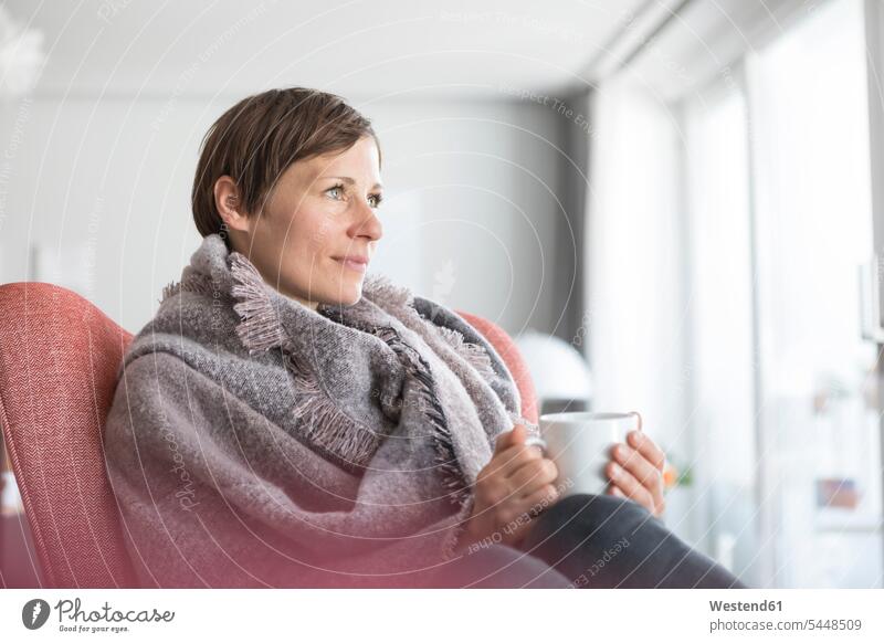 Portrait of woman relaxing with cup of coffee at home females women Adults grown-ups grownups adult people persons human being humans human beings Memory