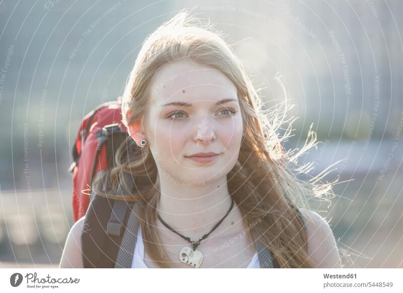 Portrait of a teenage girl, travellng with backpack Teenage Girls female teenagers visiting viewing Traveller Travellers Travelers backpacker Backpackers