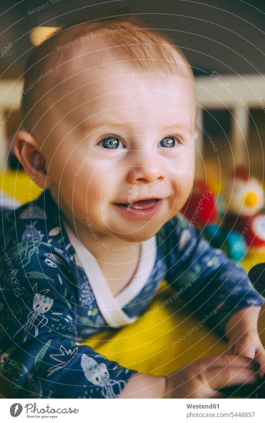 Portrait of happy baby boy in his crib portrait portraits Cot children's bed baby boys male beds babies infants people persons human being humans human beings