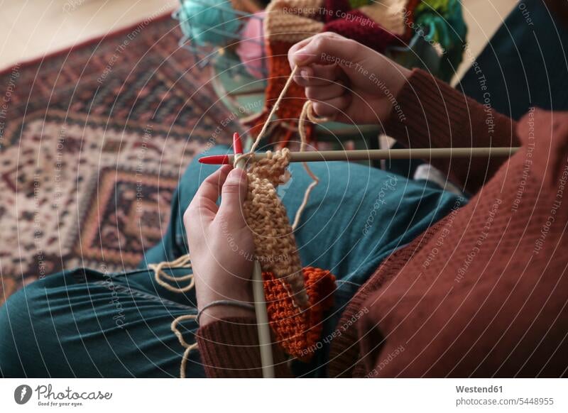 Man knitting scarf, partial view hand human hand hands human hands people persons human being humans human beings hobby hobbies men males Knitting Needle
