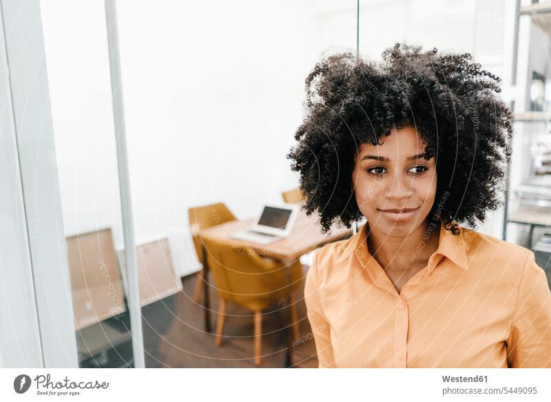 Portrait of young woman in office females women portrait portraits smiling smile Adults grown-ups grownups adult people persons human being humans human beings