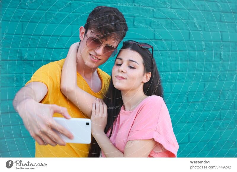 Young couple in love taking a selfie head to head, Stock Photo, Picture And  Royalty Free Image. Pic. WES-RTBF000218 | agefotostock