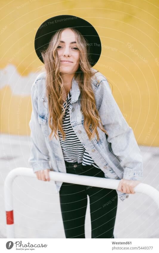 Portrait of fashionable young woman wearing hat portrait portraits hats females women Adults grown-ups grownups adult people persons human being humans