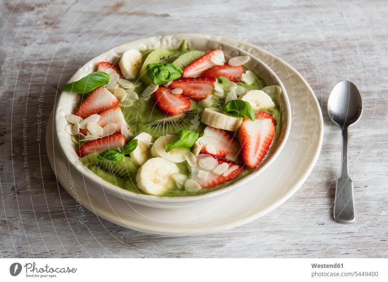 Smoothie Bowl with strawberries, banana, kiwi and slices almonds Breakfast ready to eat ready-to-eat Freshness fresh healthy eating nutrition sliced almonds