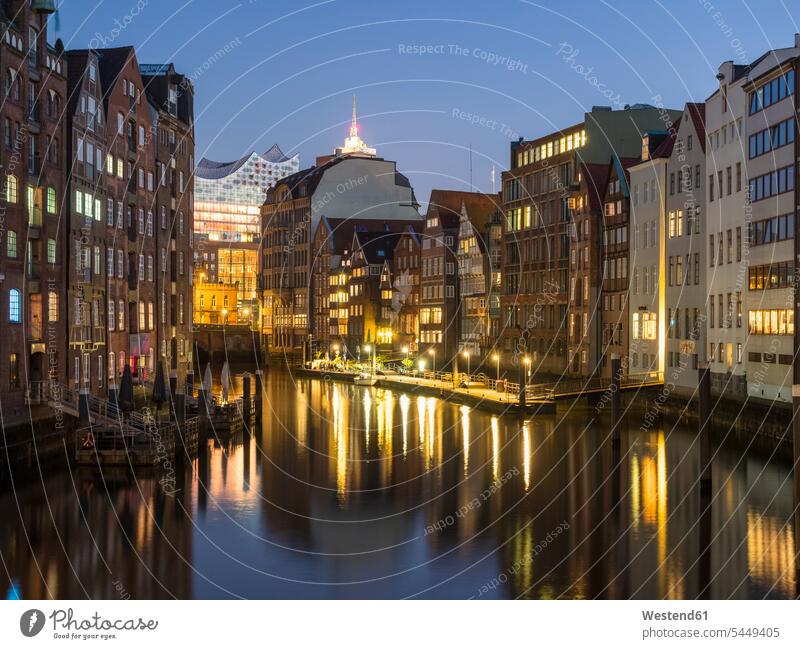Germany, Hamburg, Nikolai canal with Elbphilharmonie in the background illuminated lit lighted Illuminating city view city pictures city views urban
