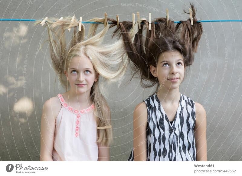 Girls hair drying on clothesline portrait portraits girl females girls child children kid kids people persons human being humans human beings Clothesline