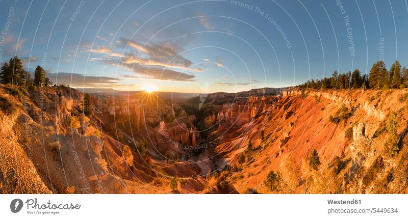 USA, Utah, Bryce Canyon National Park, hoodoos in amphitheater as seen from Rim Trail at sunrise rock formation Rock Formations Incidental people