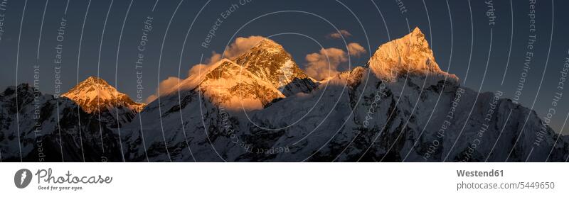 Nepal, Himalaya, Khumbu, Everest region, sunset on Everest and Nuptse High Mountains outdoors outdoor shots location shot location shots Moody Sky Mount Everest