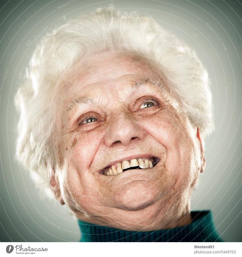 Portrait of an elderly lady smiling smile senior women elder women elder woman old senior woman cheerful gaiety Joyous glad Cheerfulness exhilaration merry gay
