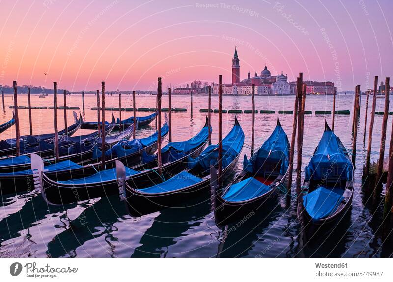 Italy, Venice, View of Giudecca from St Mark's Square with gondolas landmark sight place of interest historic ancient historical morning in the morning
