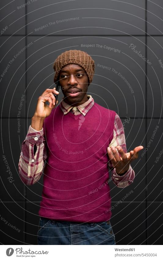 Portrait of man on the phone call telephoning On The Telephone calling portrait portraits men males telephone call Phone Call using phone Using Phones Adults