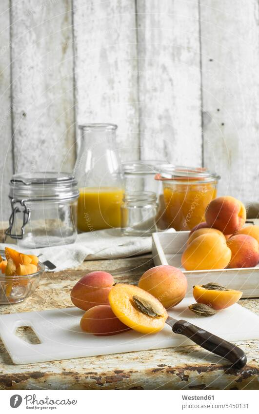Preparing apricot jam Kitchen Knife Kitchen Knives apricot smoothie Chopping Board Cutting Boards Chopping Boards Fruit Juice Fruit Juices Glass Glasses half