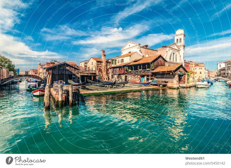 Italy, Venice, gondola shipyard at Rio di San Trovaso cloud clouds Architecture sunlight Sunlit water boat boats UNESCO World Heritage World Cultural Heritage