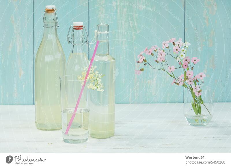 Bottles and glass of homemade elderflower sirup food and drink Nutrition Alimentation Food and Drinks home made home-made flower head flower heads aroma flavour