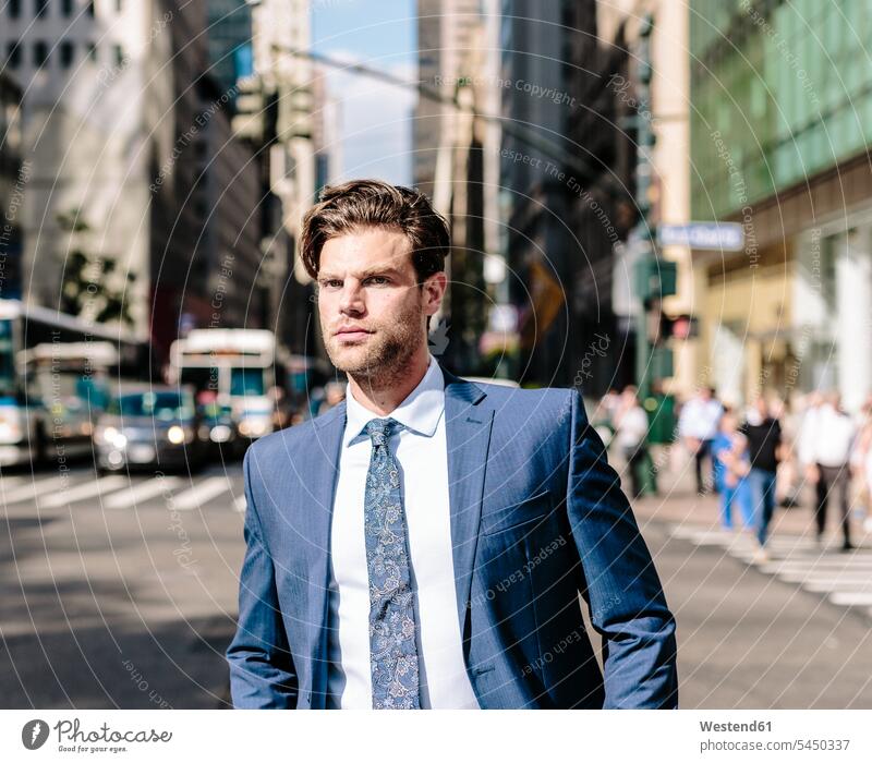 Handsome businessman walking in Manhattan attractive beautiful pretty good-looking Attractiveness cool attitude composed coolness laid-back going Businessman