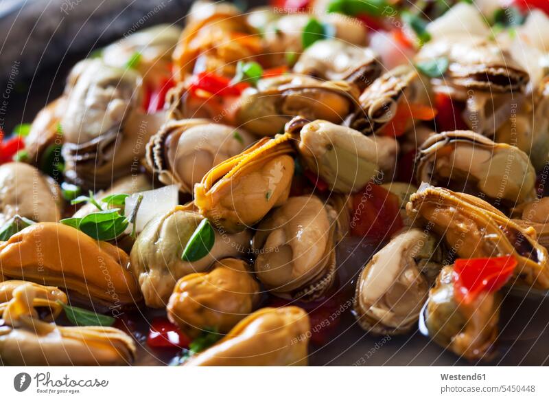 Marinated blue mussels, close-up Part Of partial view cropped braising pan marinade Garlic Red Bell Pepper red pepper Red Bell Peppers Mediterranean Food