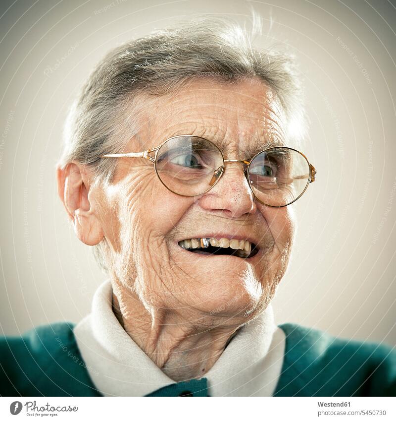 Portrait of an elderly lady cheerful gaiety Joyous glad Cheerfulness exhilaration merry gay laughing Laughter smiling smile glasses specs Eye Glasses spectacles