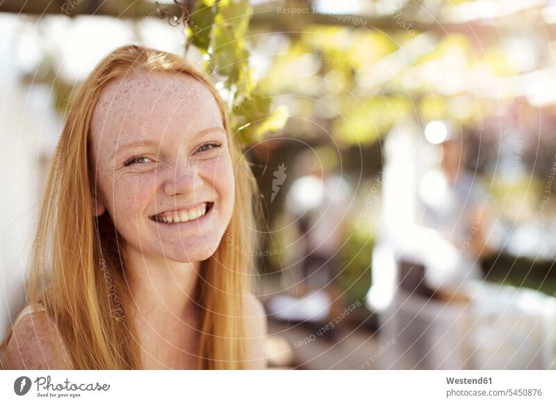 Portrait of happy girl with long red hair portrait portraits smiling smile females girls child children kid kids people persons human being humans human beings