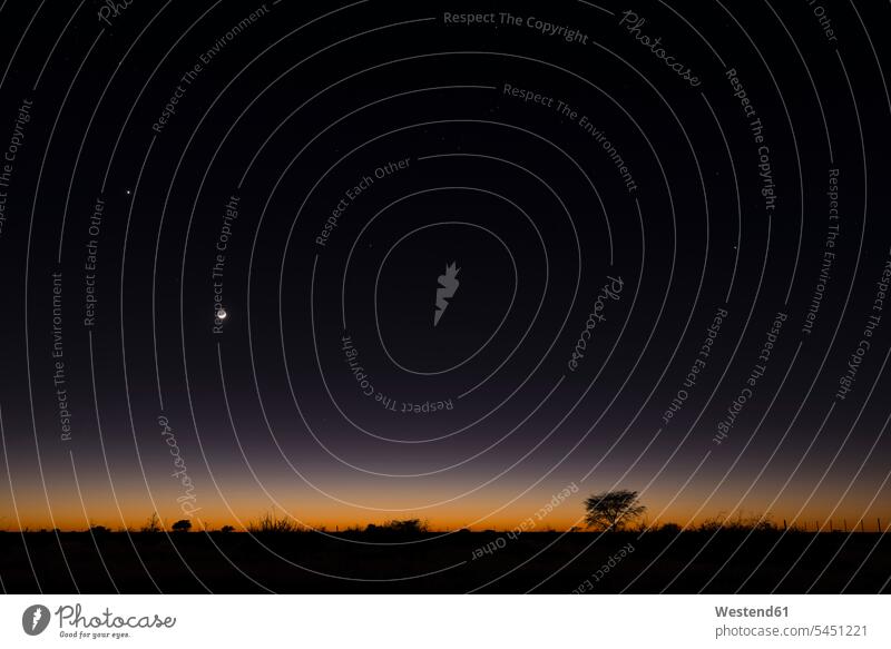Namibia, Region Khomas, near Uhlenhorst, Astrophoto, RIsing moon and Planet Venus above a glowing savannah horizon landscape landscapes scenery terrain nature