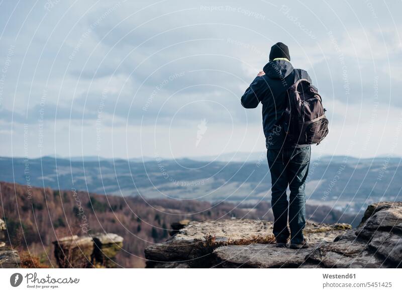 Czechia, Bohemian Switzerland, Tisa, Tyssa Walls, back view of man taking picture men males Adults grown-ups grownups adult people persons human being humans