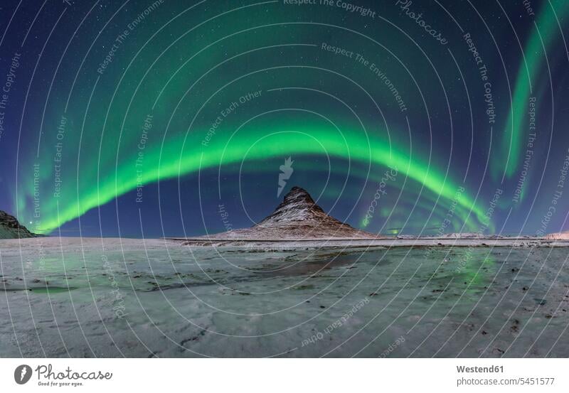 Iceland, Kirkjufell mountain with northern lights beauty of nature beauty in nature snow-covered snow covered covered in snow snowy peak mountain peak