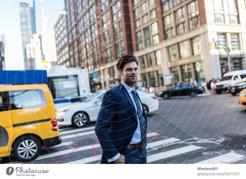 Businessman in the streets of Manhattan with yellow cab in background attractive beautiful pretty good-looking Attractiveness Handsome commuter commuters