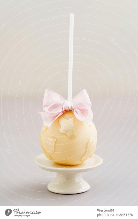 Cake pop with edible paper and rbbon food and drink Nutrition Alimentation Food and Drinks Sweets Candies Sweet Food golden Gold Color Gold Colored nobody
