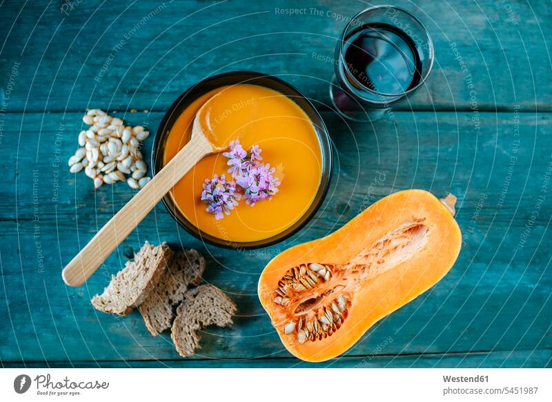 Bowl of creamed pumpkin soup wooden spoon wooden spoons ready to eat ready-to-eat mashed puréed Bottle Gourd Calabash Gourds healthy eating nutrition