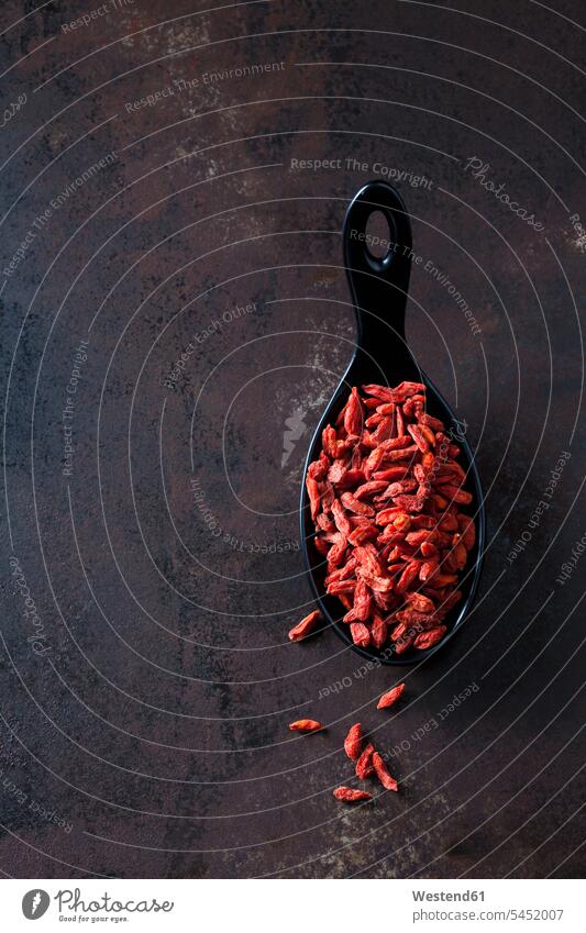 Spoon of dried wolfberries on rusty metal red dried fruit Dried Fruits Wolfberry Goji Berries Wolfberries Goji Berry Chinese boxthorn Chinese wolfberries