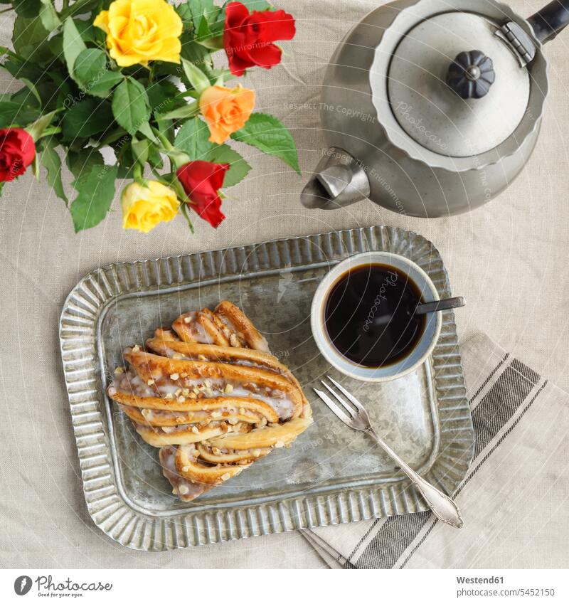 Striezel pastry and cup of coffee food and drink Nutrition Alimentation Food and Drinks nobody Coffee Strietzel coffee pot coffee pots coffeepots Flower Flowers
