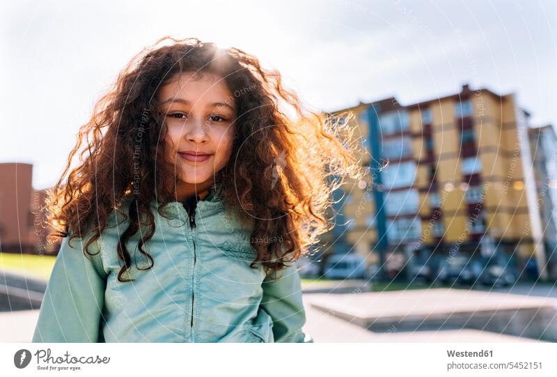 Portrait of smiling girl at backlight portrait portraits females girls child children kid kids people persons human being humans human beings smile one person 1