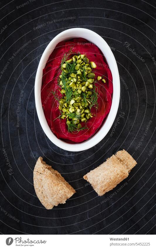 Beetroot Hummus Bowl Bowls garnished piece pieces chunks part parts ready to eat ready-to-eat mashed puréed black background black backgrounds dill