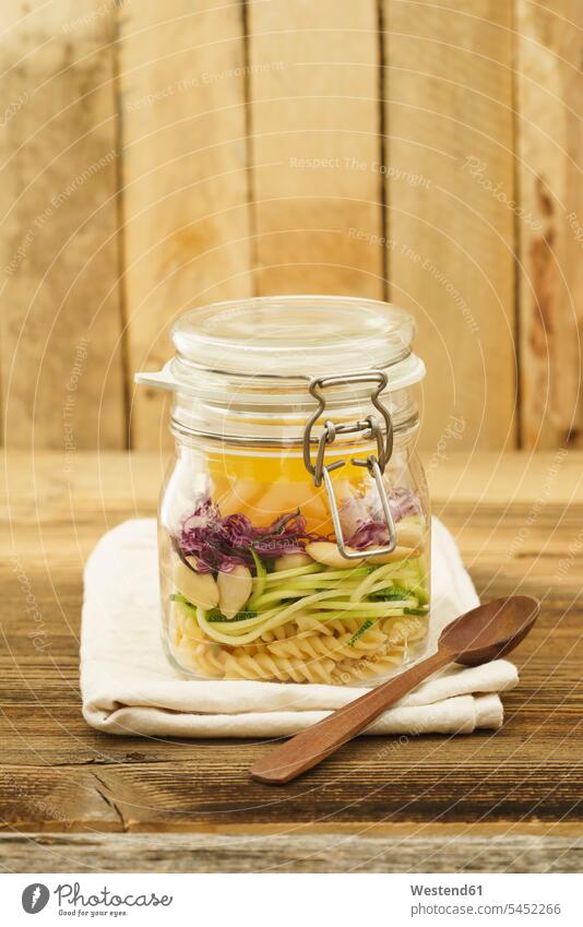 Preserving jar of vegan mixed salad with pasta homemade home made home-made folded healthy eating nutrition Vinaigrette Dressing Lunch wooden spoon