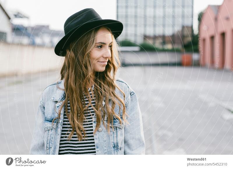 Portrait of fashionable young woman wearing hat hats portrait portraits females women Adults grown-ups grownups adult people persons human being humans