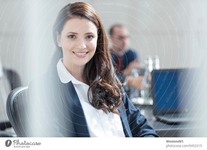 Portrait of smiling businesswoman on a meeting in conference room portrait portraits businesswomen business woman business women smile Business Meeting