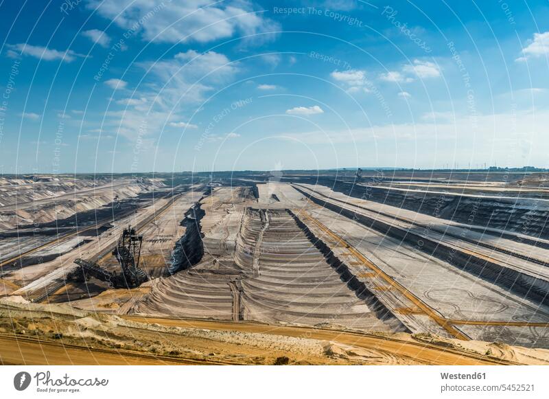 Germany, Garzweiler surface mine, layers and giant excavator technology technologies engineering soil ecocide mining vastness wide Broad Far copy space wideness
