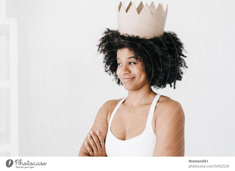Fit young woman wearing paper crown females women fit Success successful crowns queen queens training Sport Training Adults grown-ups grownups adult people