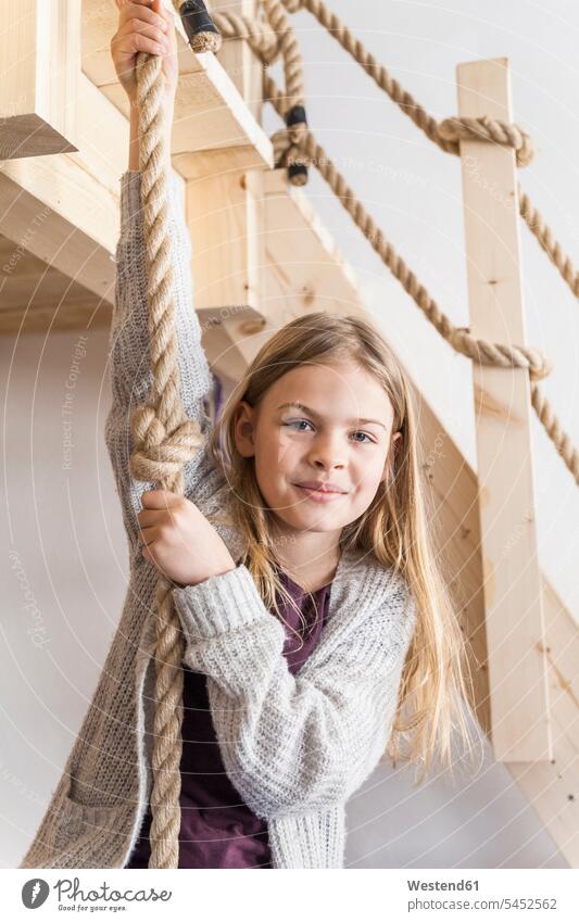 Portrait of girl in children's room portrait portraits females girls kid kids people persons human being humans human beings rope ropes climbing hanging