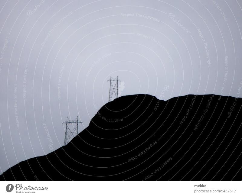 Bergstrom Electricity pylon stream Horizon Mountain Dark Transmission lines Silhouette power line Hill height Energy industry Cable Sky High voltage power line