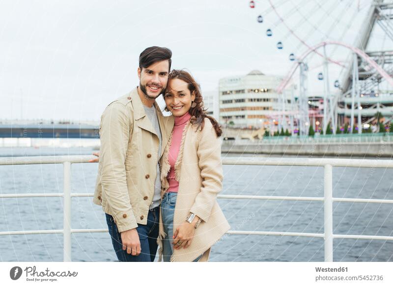 Japan, Tokyo, portrait of couple in love portraits twosomes partnership couples people persons human being humans human beings Tokio smiling smile tourist