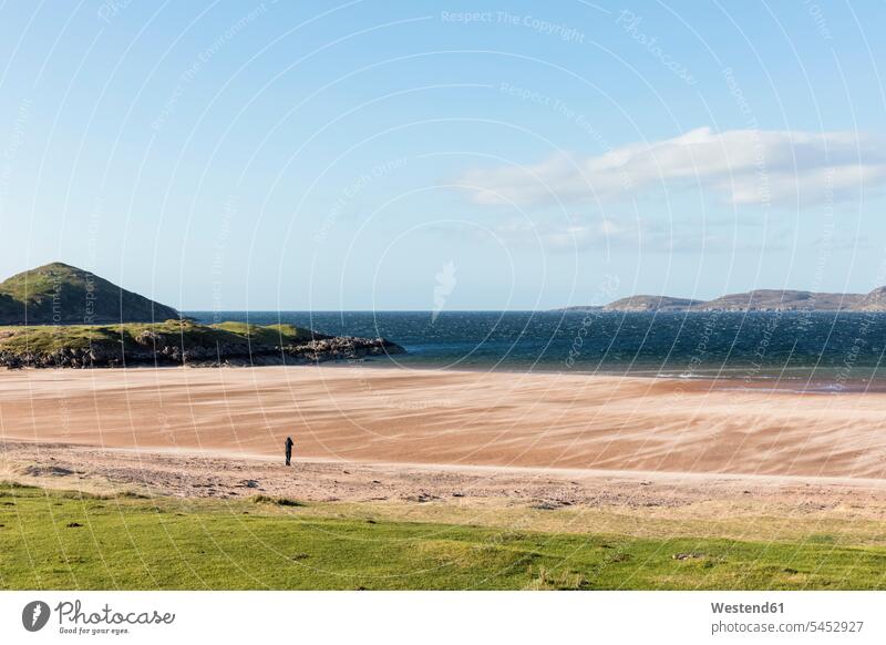 UK, Scotland, Scottish Highlands, Loch Ewe, Poolewe, tourist at Firemore Beach sand sandy one person 1 one person only only one person outdoors outdoor shots