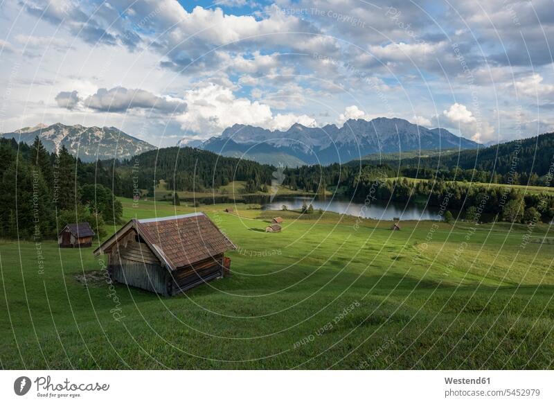 Germany, Bavaria, Werdenfelser Land, lake Geroldsee with hay barn, in background the Karwendel mountains cloud clouds View Vista Look-Out outlook nature