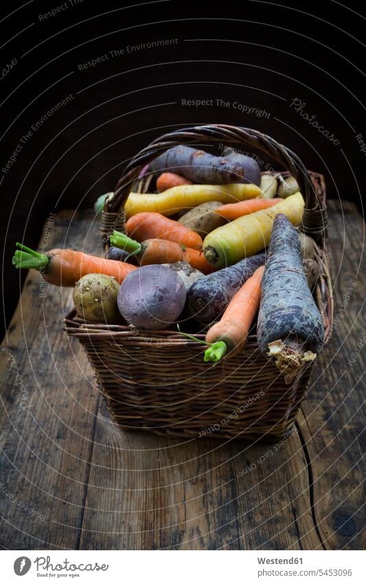 Winter vegetables, carrot, beetroot, potato and parsnip black background black backgrounds copy space raw rich in vitamines rustic winter vegetables abundance
