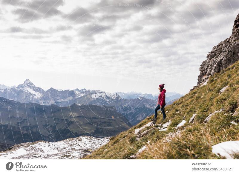 Germany, Bavaria, Oberstdorf, hiker in alpine scenery mountain range mountains mountain ranges woman females women hiking landscape landscapes terrain Adults