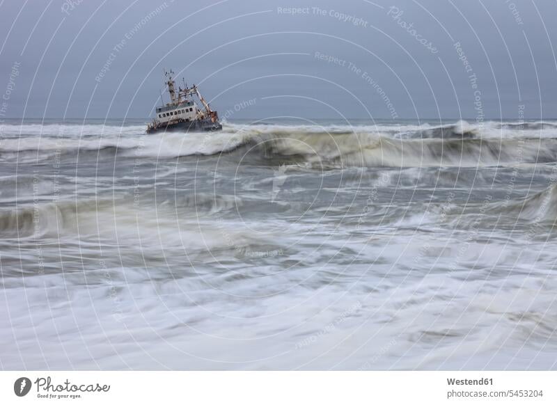Namibia, Skeleton Coast, ship wreck boat near Swakopmund storm tempest stormy blustery storms nobody breaking wave breaking waves boats Sea ocean rusty rusting