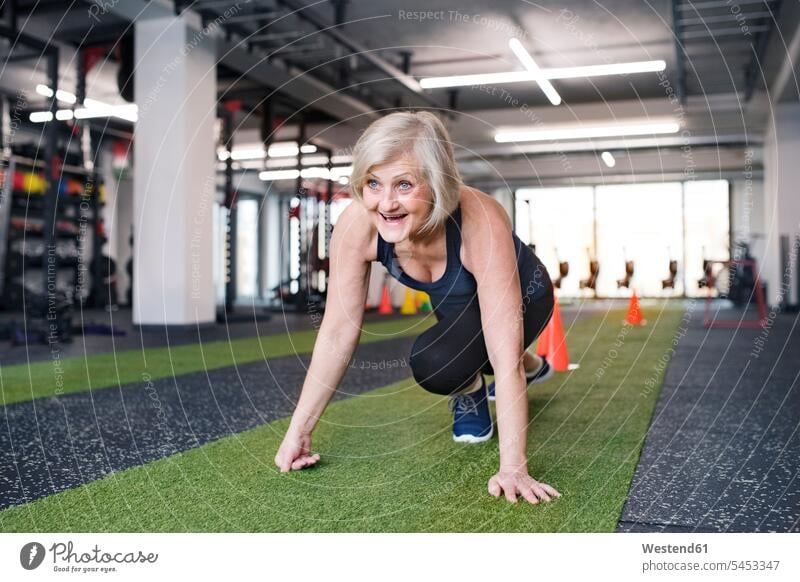 Older woman working out. At the gym , #AFFILIATE, #woman, #Older, #gym,  #working #ad