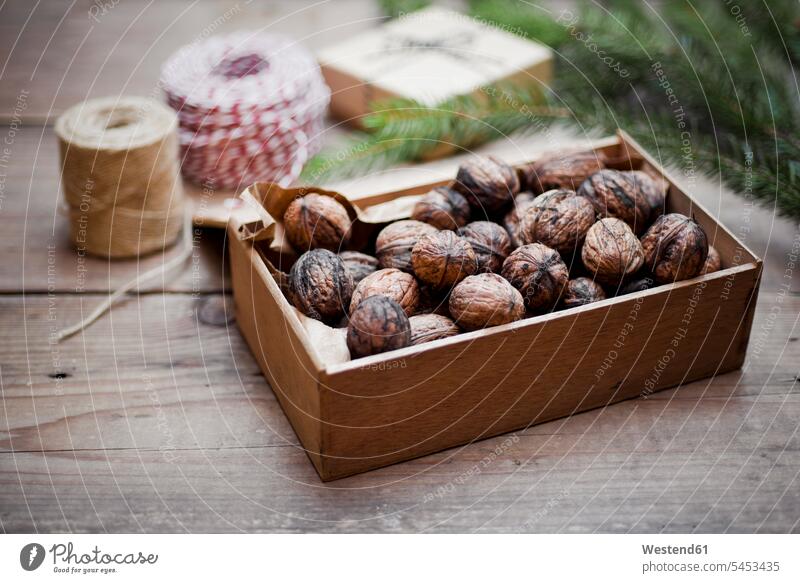 Wooden box of organic walnuts food and drink Nutrition Alimentation Food and Drinks focus on foreground Focus In The Foreground focus on the foreground