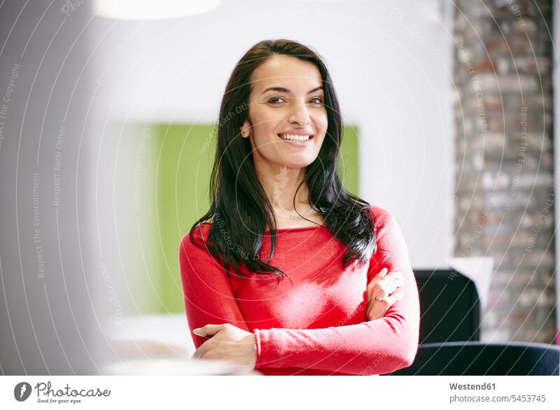 Portrait of a confident businesswoman businesswomen business woman business women smiling smile entrepreneur entrepreneurs business people businesspeople